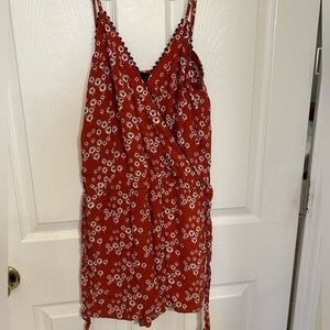 Red loft romper with white and black floral pattern